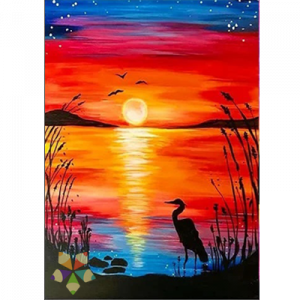 garza atardecer sol astro celajes laguna ave elegante